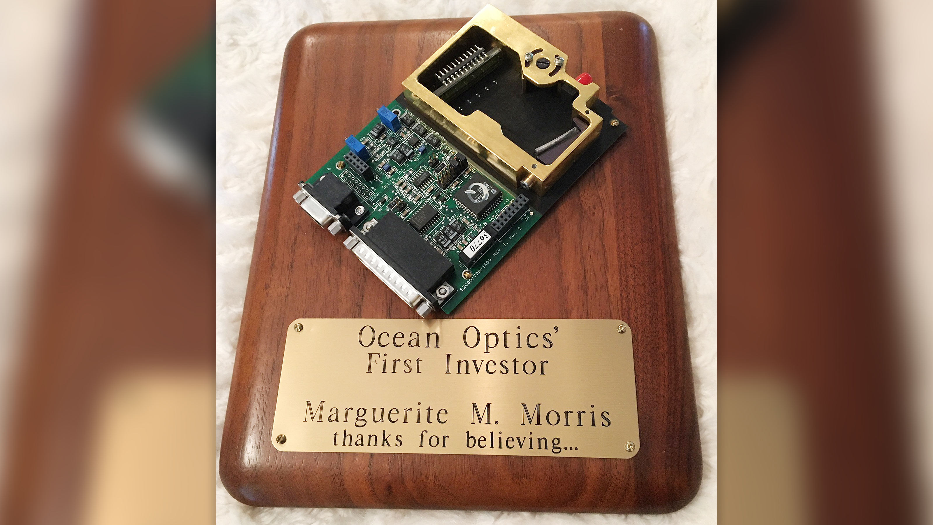 Image of a plaque for the first investor in Ocean Optics, now Ocean Insight